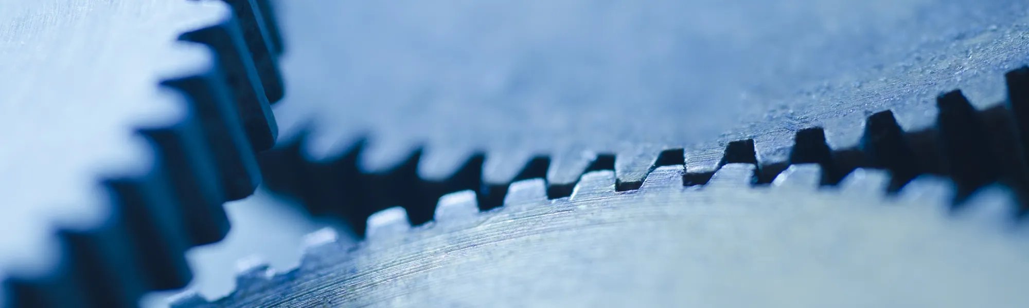 A close-up image of cogs in a machine.