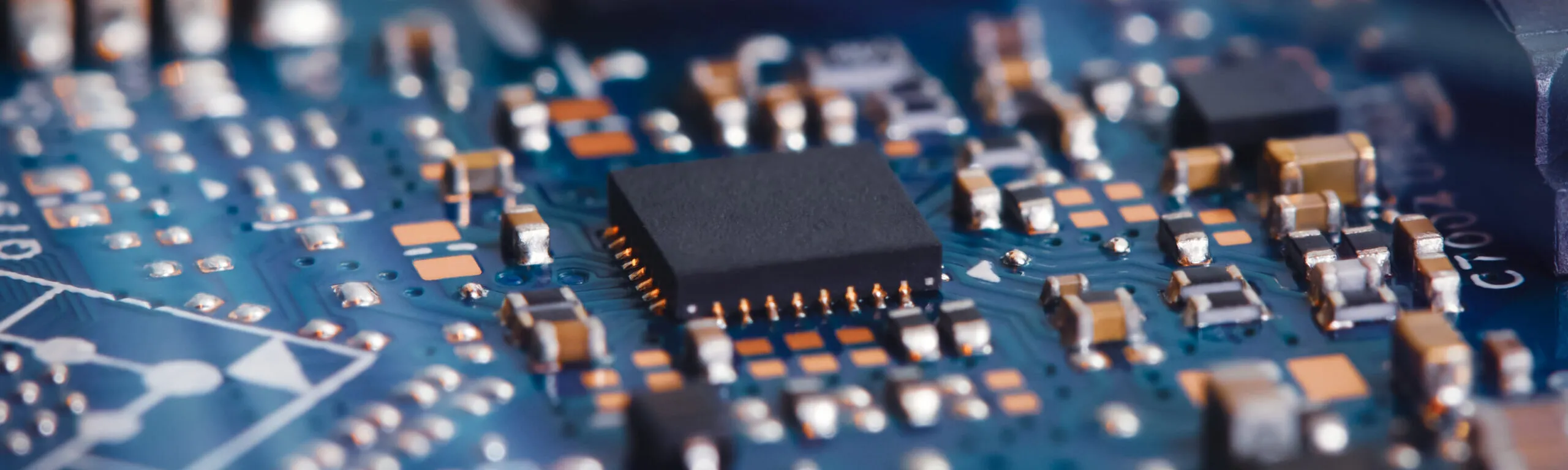 An image of a computer microchip at close range.